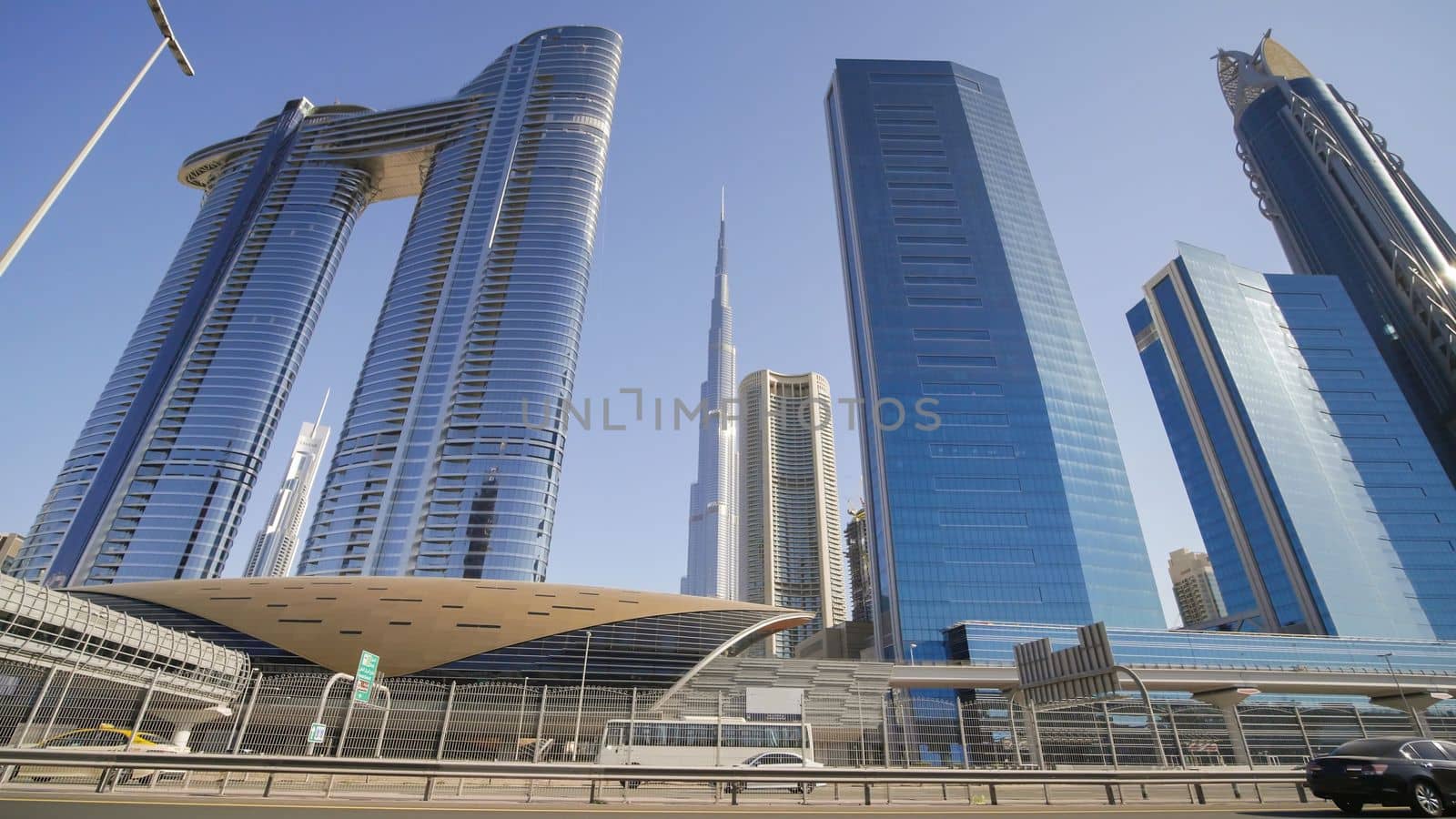 Tall and modern skyscrapers of Dubai on a sunny day