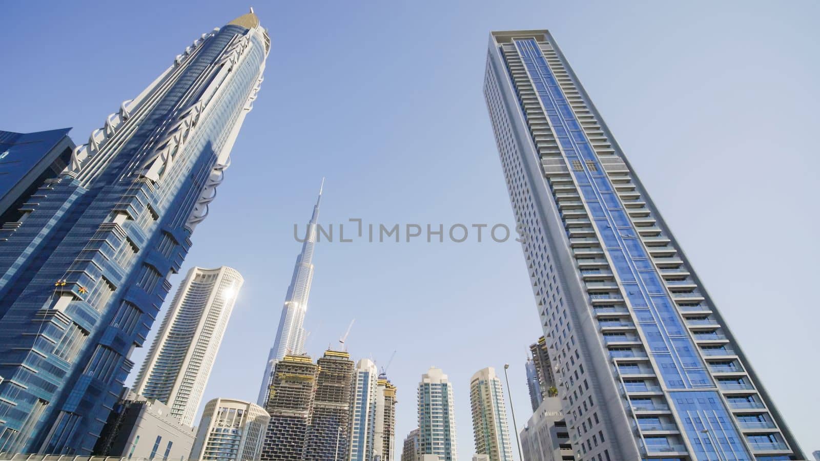 Tall and modern skyscrapers of Dubai on a sunny day