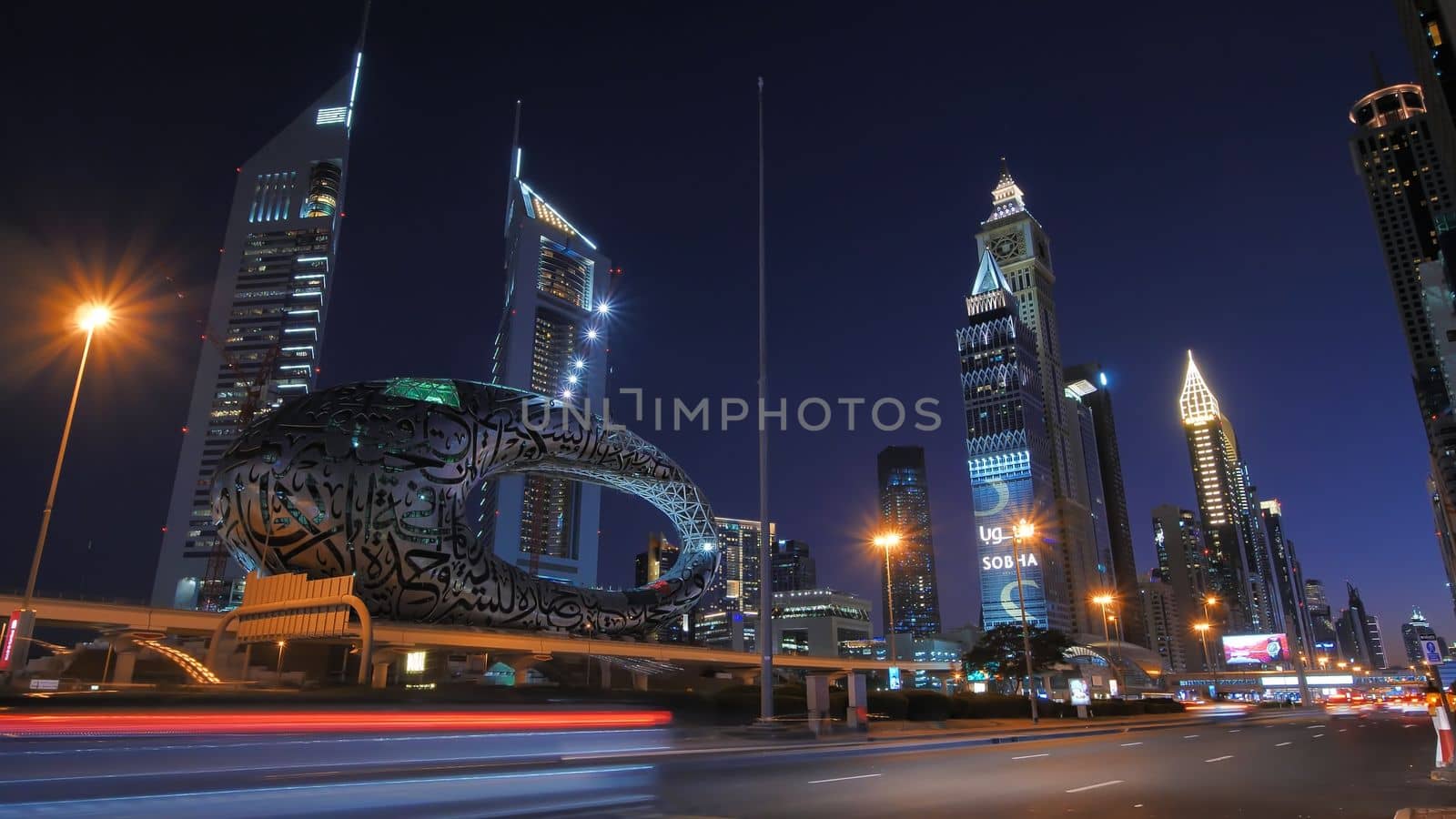 Night traffic on the central street of Sheikh Zayed in Dubai