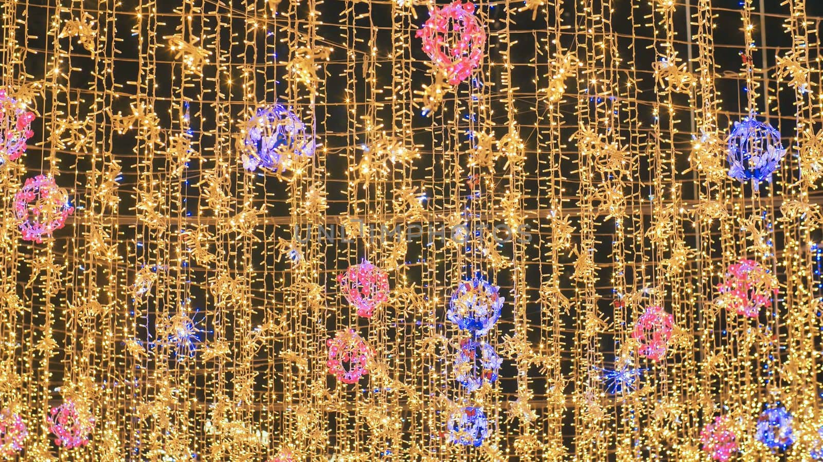 Hanging illumination on the streets of city