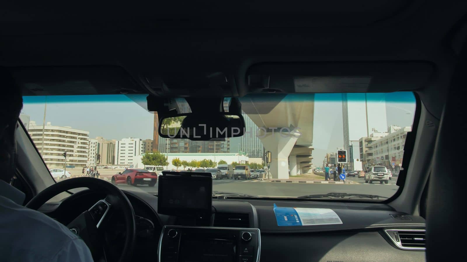 View from the cab of a car taxi to the streets of Dubai