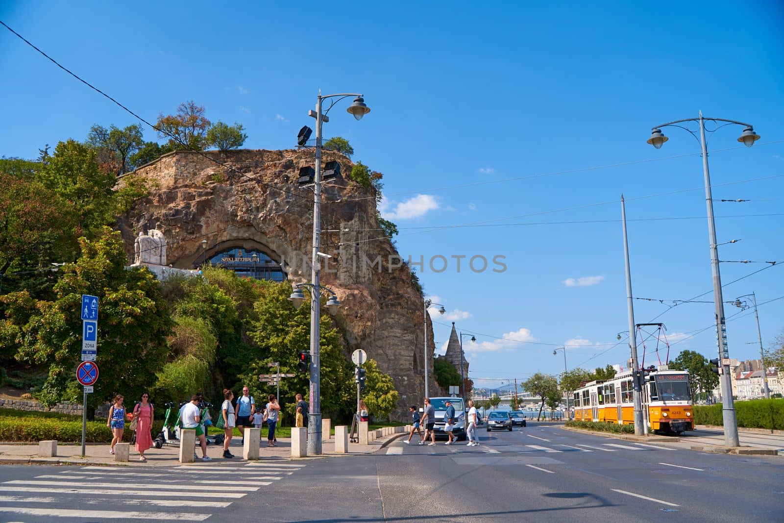 The building is carved into the rock and covered with glass. Modern architecture. Budapest, Hungary - 08.25.2022