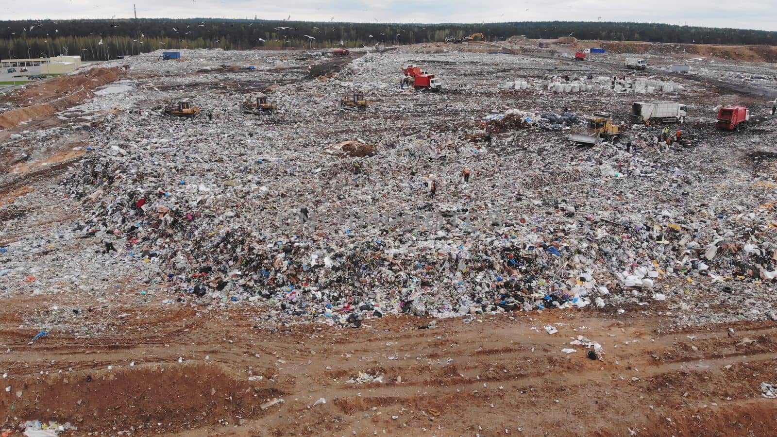 Large landfill near the metropolis. View from the drone