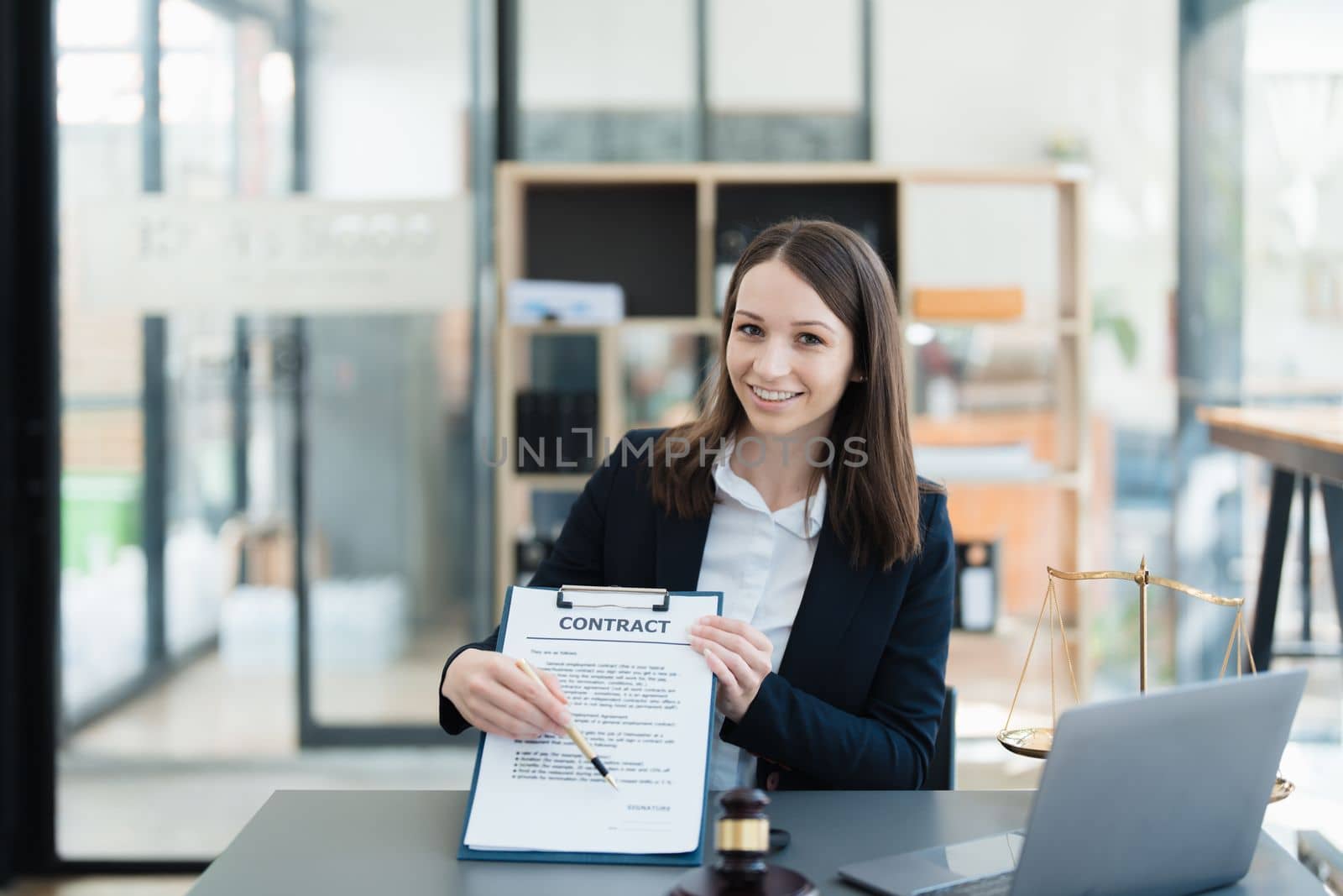 The lawyer with a client discussing contract paper, a Business lawyer working about legal legislation in the courtroom to help their customer, contract and agreement concept