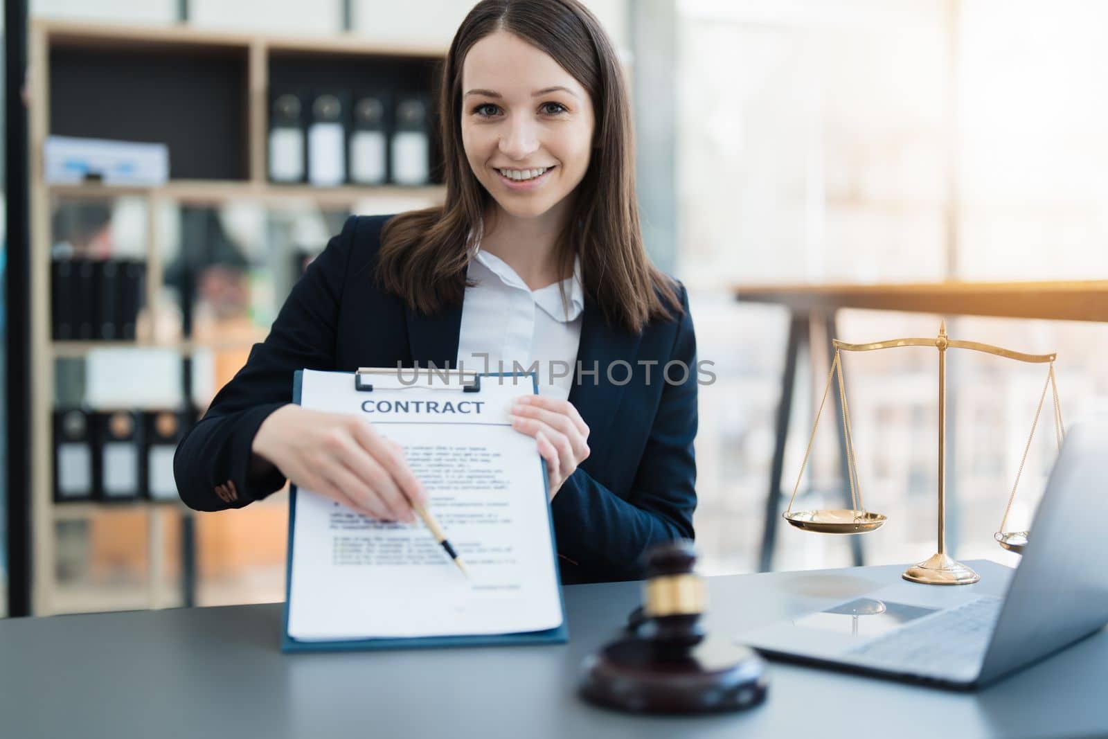 The lawyer with a client discussing contract paper, a Business lawyer working about legal legislation in the courtroom to help their customer, contract and agreement concept