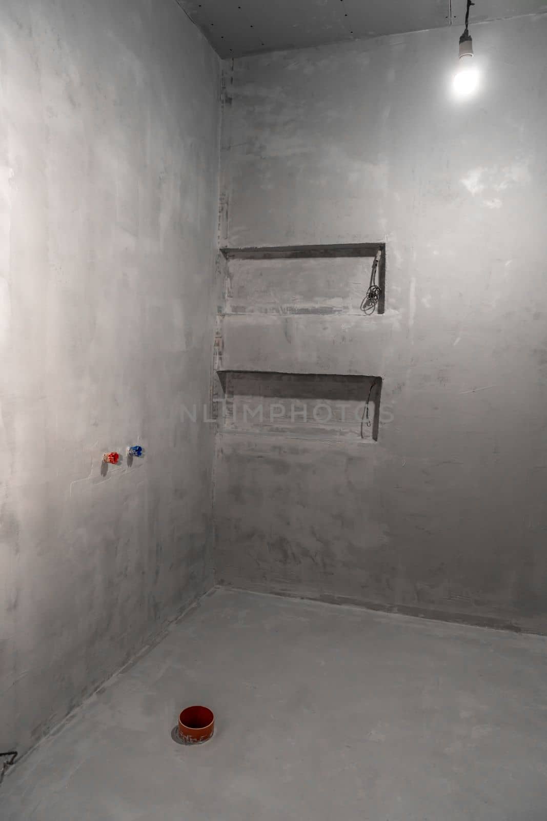 room with plastered walls on the construction site. High quality photo