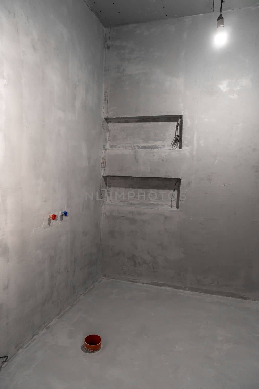 room with plastered walls on the construction site. High quality photo
