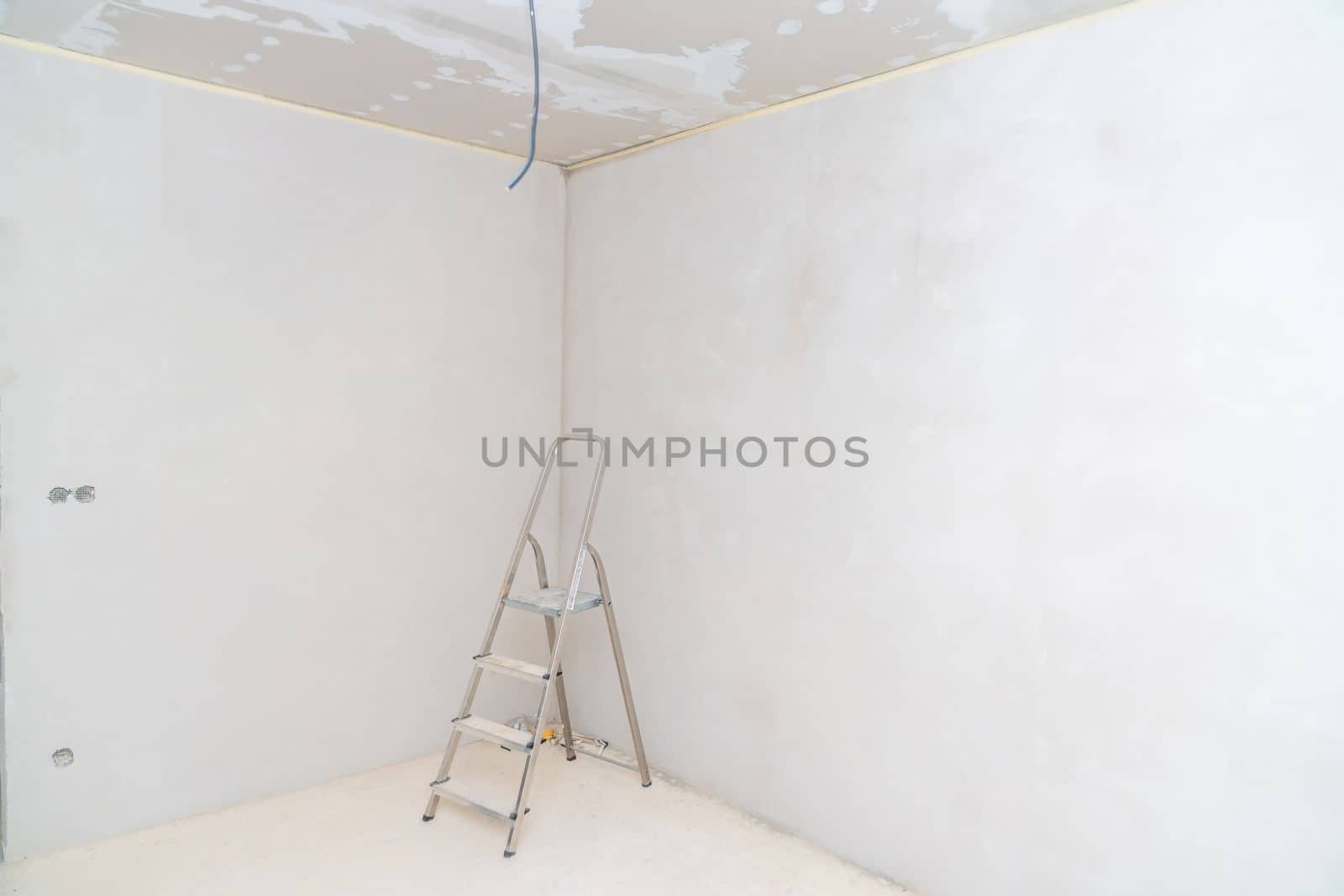folding ladder on construction site.