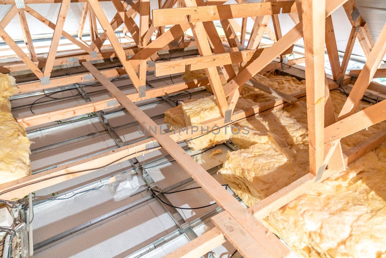 insulation of the roof and ceiling with glass wool.