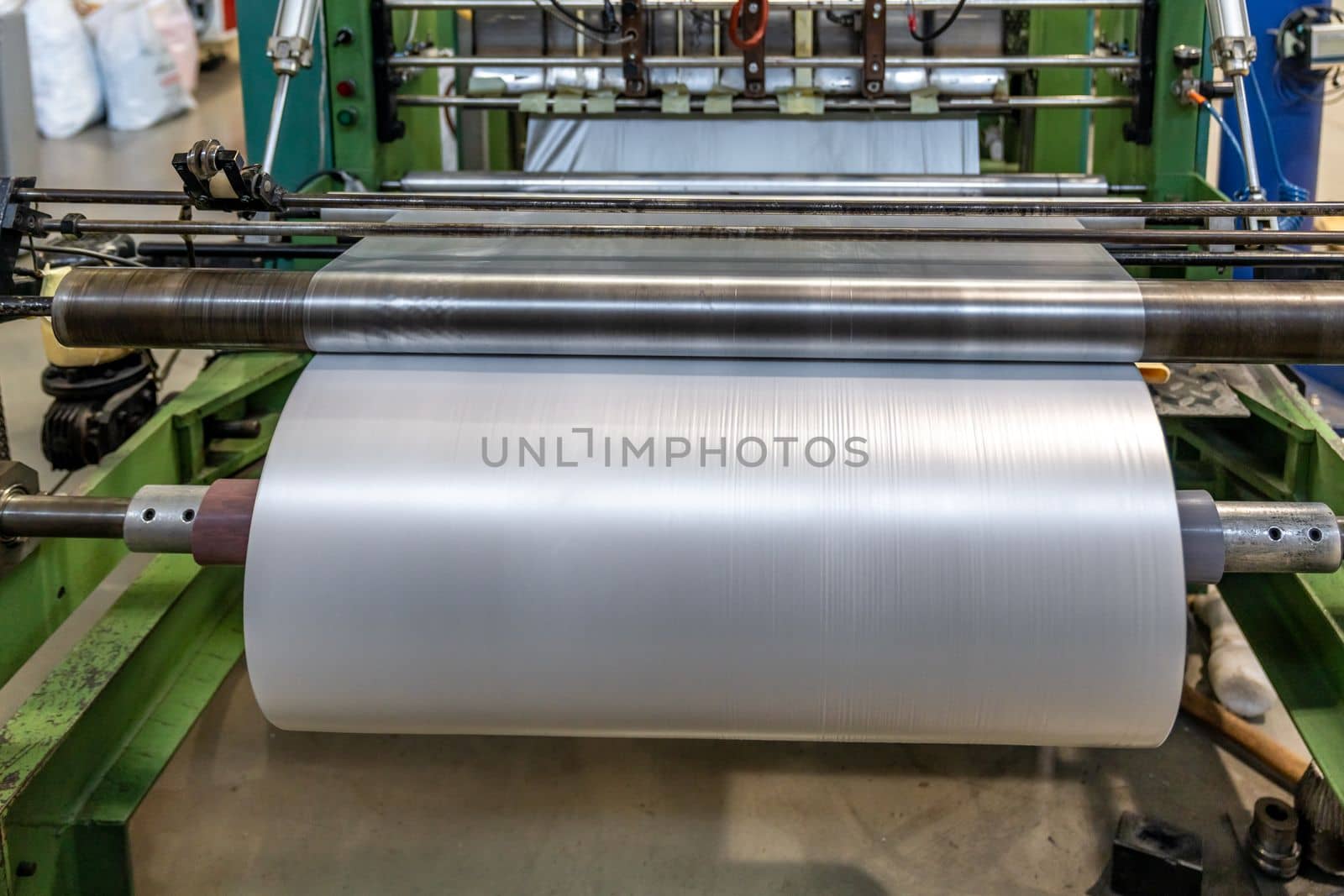plastic roll on a machine for the production of food bags by Edophoto