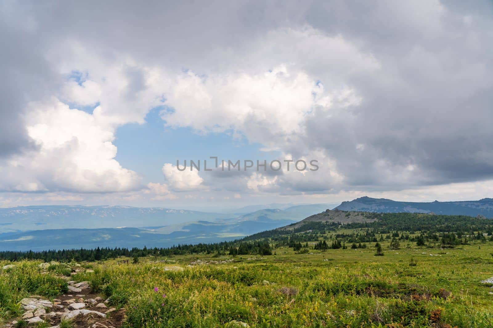 Forests and mountains of the Southern Urals near the village of Tyulyuk in Russia. Drone view
