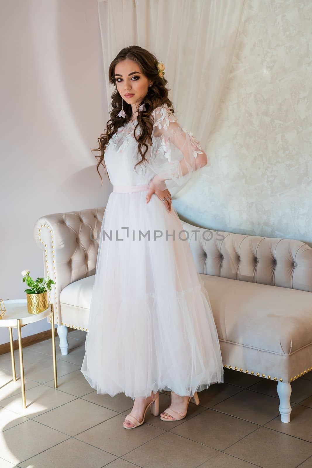 Girl model in a white festive dress. by DovidPro
