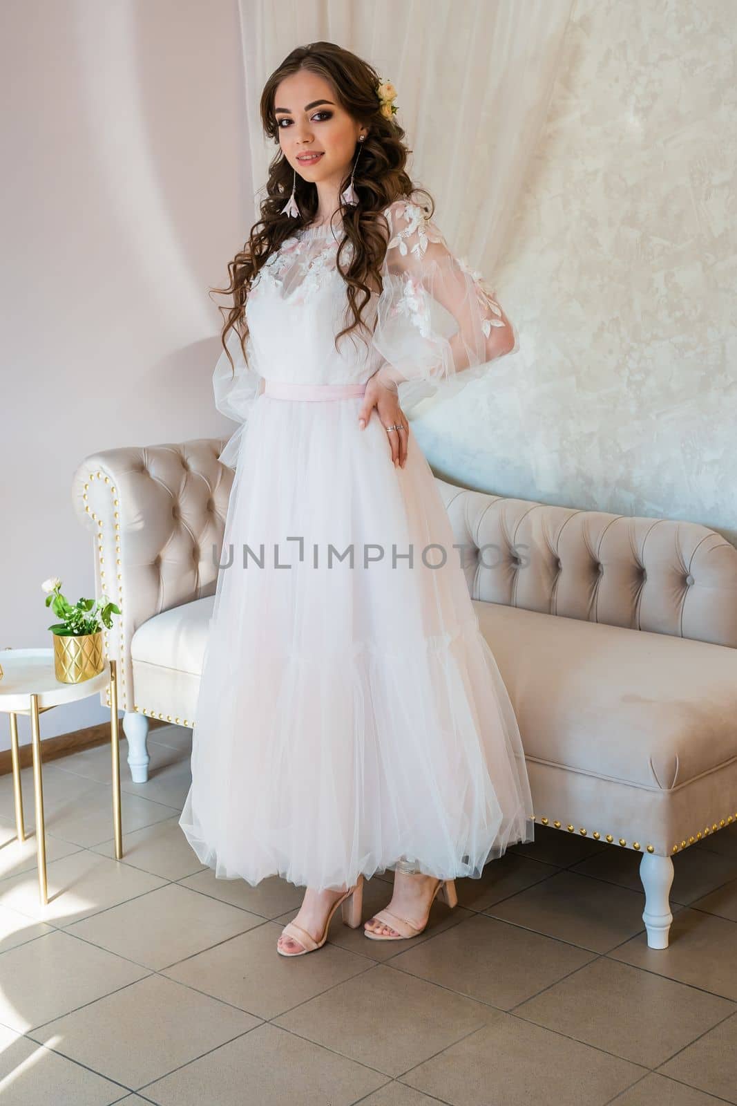Girl model posing in a wedding dress