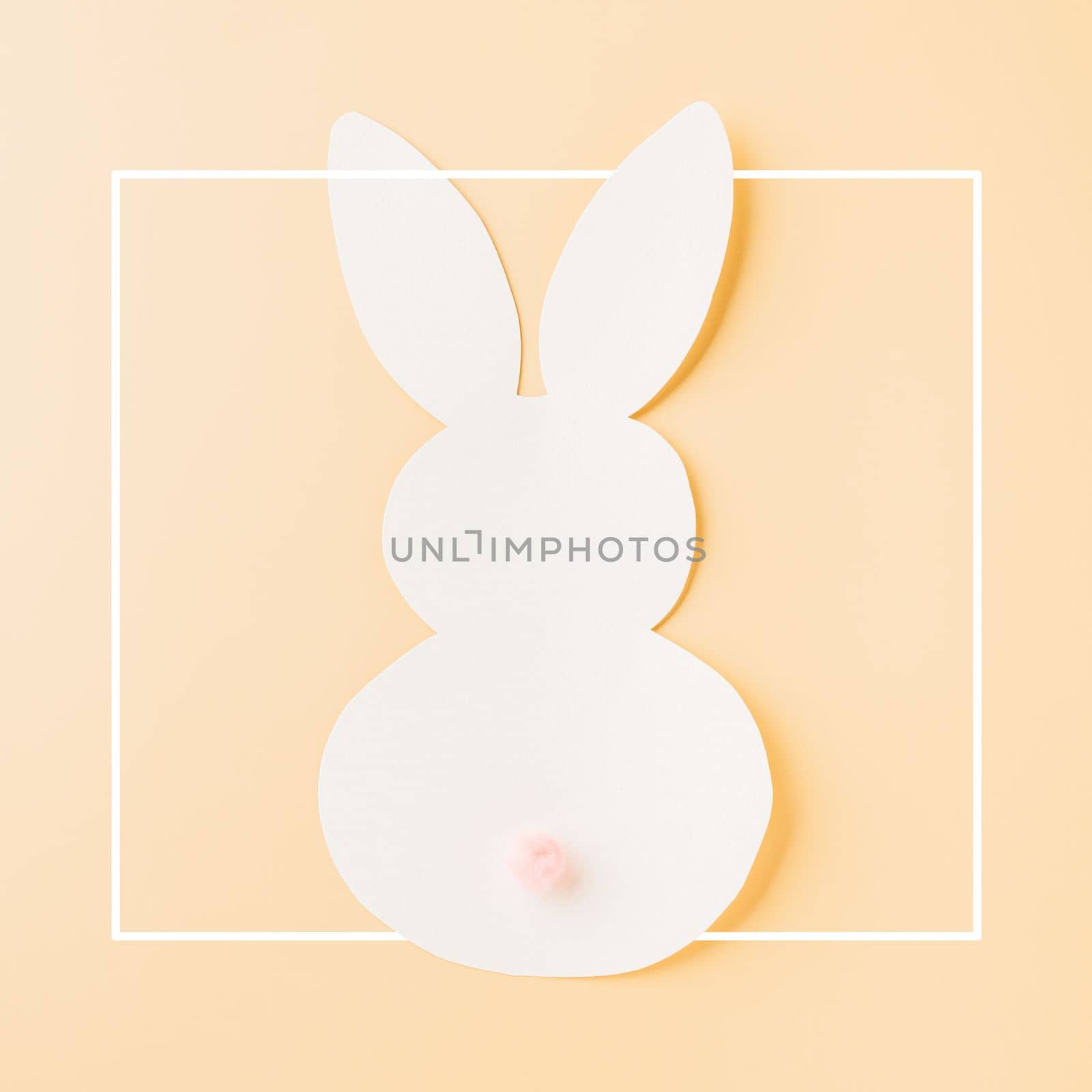 Easter Day Concept. Above overhead handmade white paper rabbit cutting isolated on pastel background with copy space for your text, Happy Easter Bunny holiday, Banner design for web
