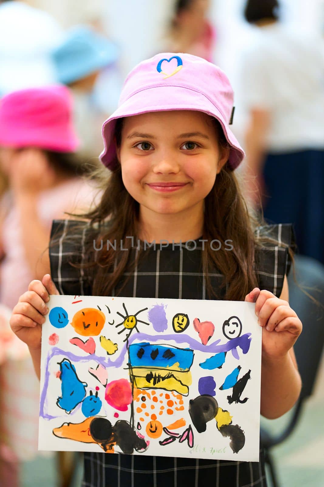 Kids in Ukraine drawing anti-war pictures. Dnipro, Ukraine - 06.10.2022
