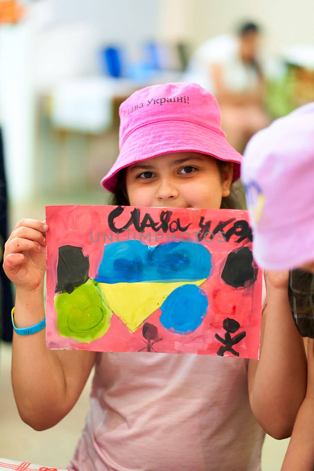 Kids in Ukraine drawing anti-war pictures. Dnipro, Ukraine - 06.10.2022