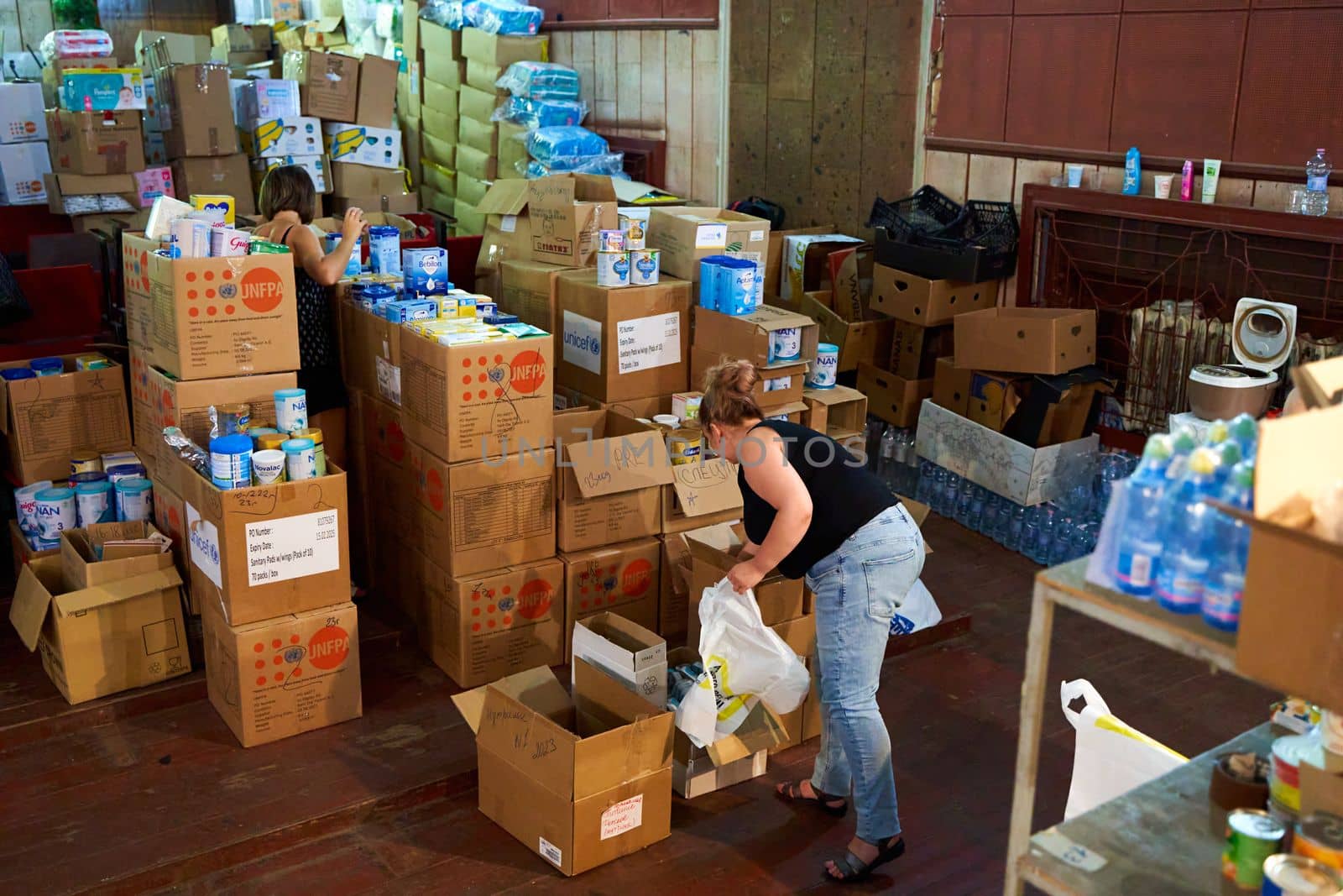 warehose of volunteer centre in Ukraine with humanitarian aid. Dnipro, Ukraine - 06.28.2022
