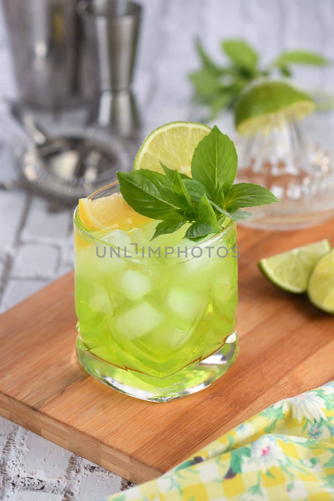 Thai basil smash cocktail   and lemon. Refreshing organic gin drink.