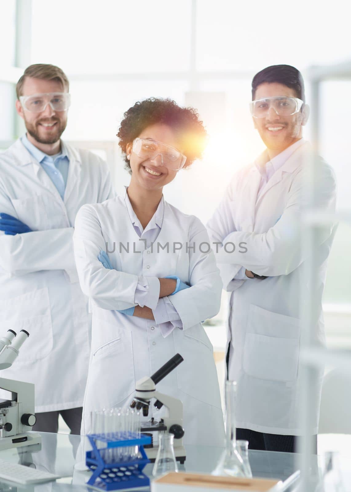 Scientists smiling together in lab