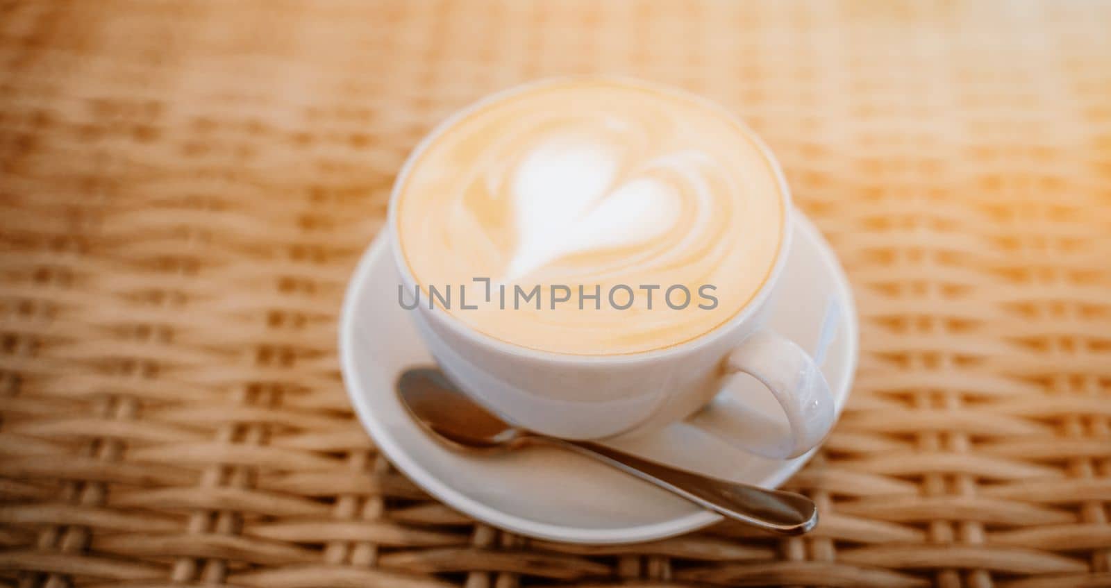 cup cappuccino baner table. Coffee with espresso and milk in a cafe.