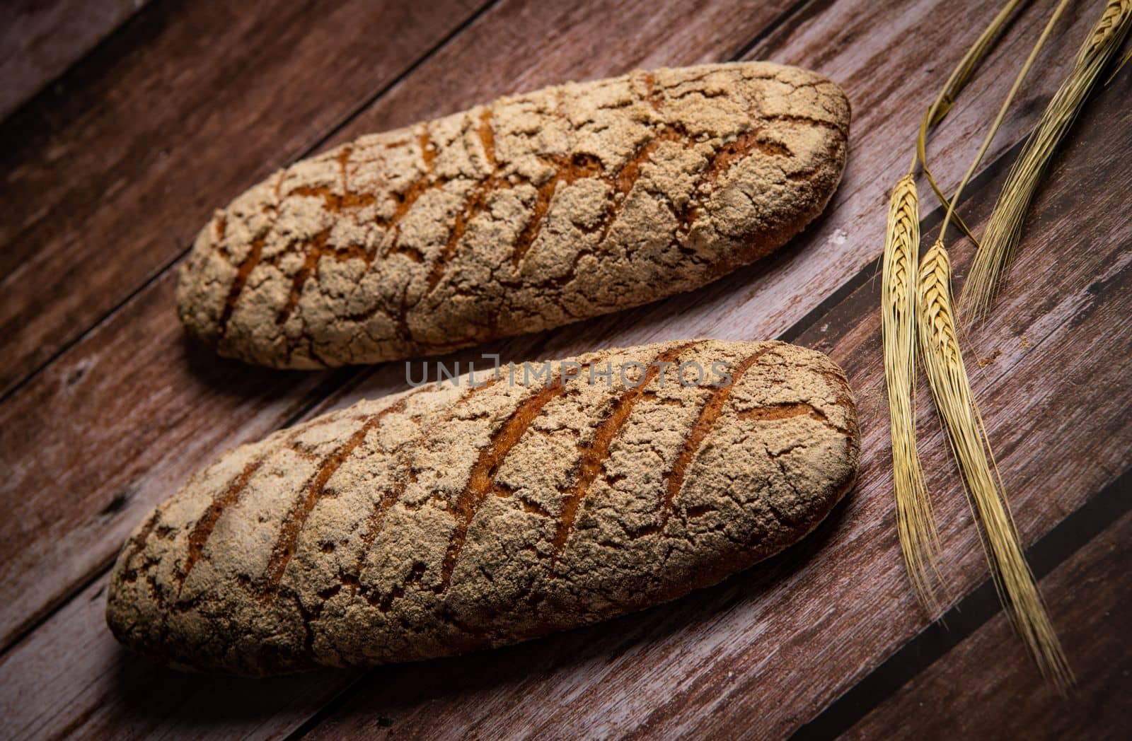 Rye bread on brown background. High quality photo