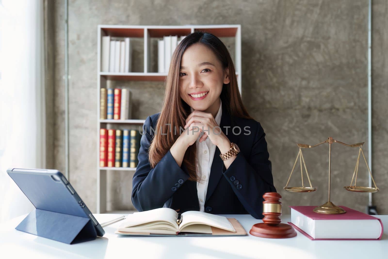 Beautiful business lawyers working with agreement contract in office. Law, legal services, advice, Justice concept by itchaznong