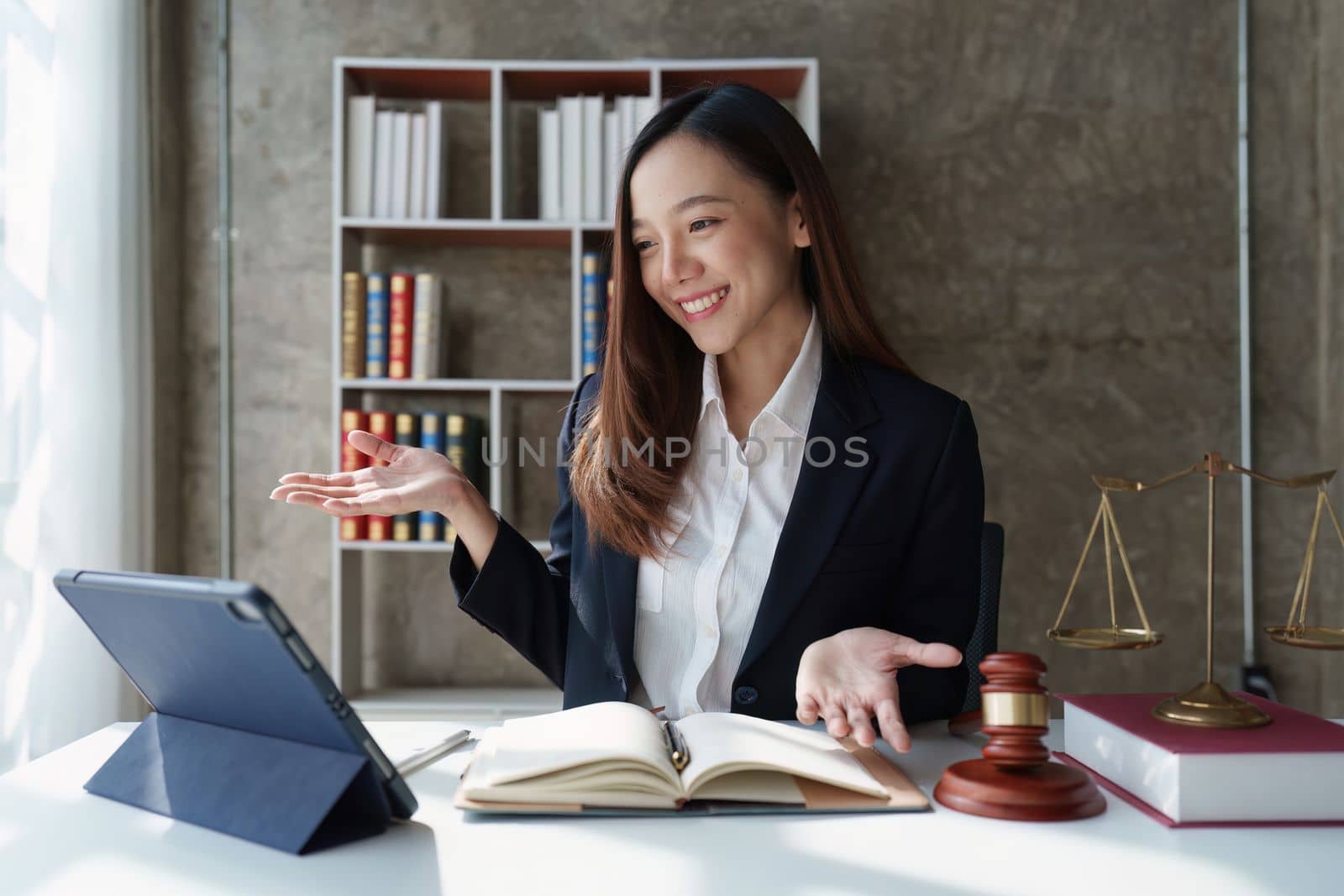 Beautiful business lawyers working with agreement contract in office. Law, legal services, advice, Justice concept by itchaznong