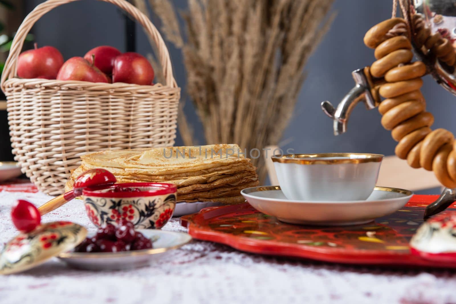 Russian pancake blini with berries and sour cream on the table. Shrovetide Maslenitsa festival concept. Top view. Flat lay