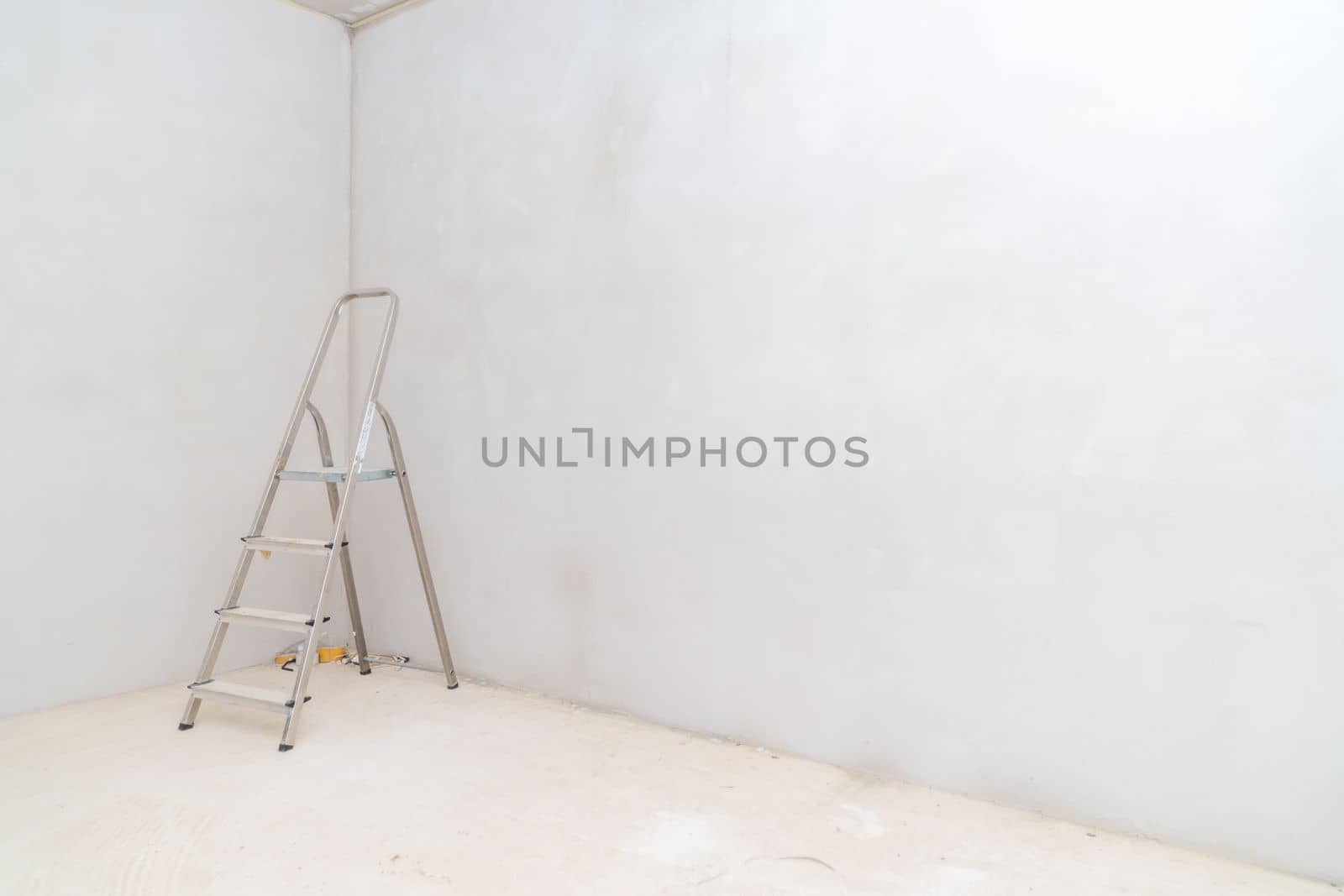 folding ladder on construction site.