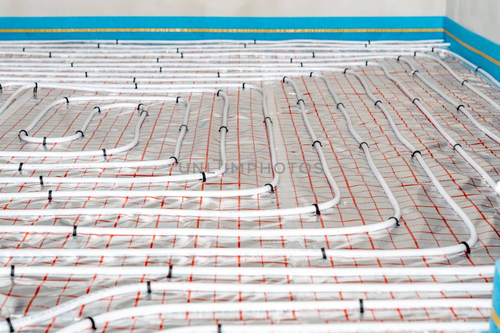 underfloor heating in the room on the construction site.