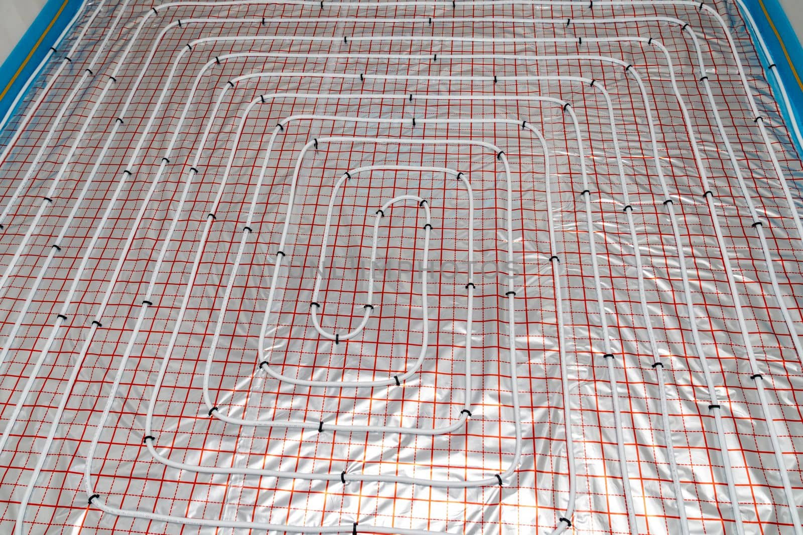 underfloor heating in the room on the construction site.