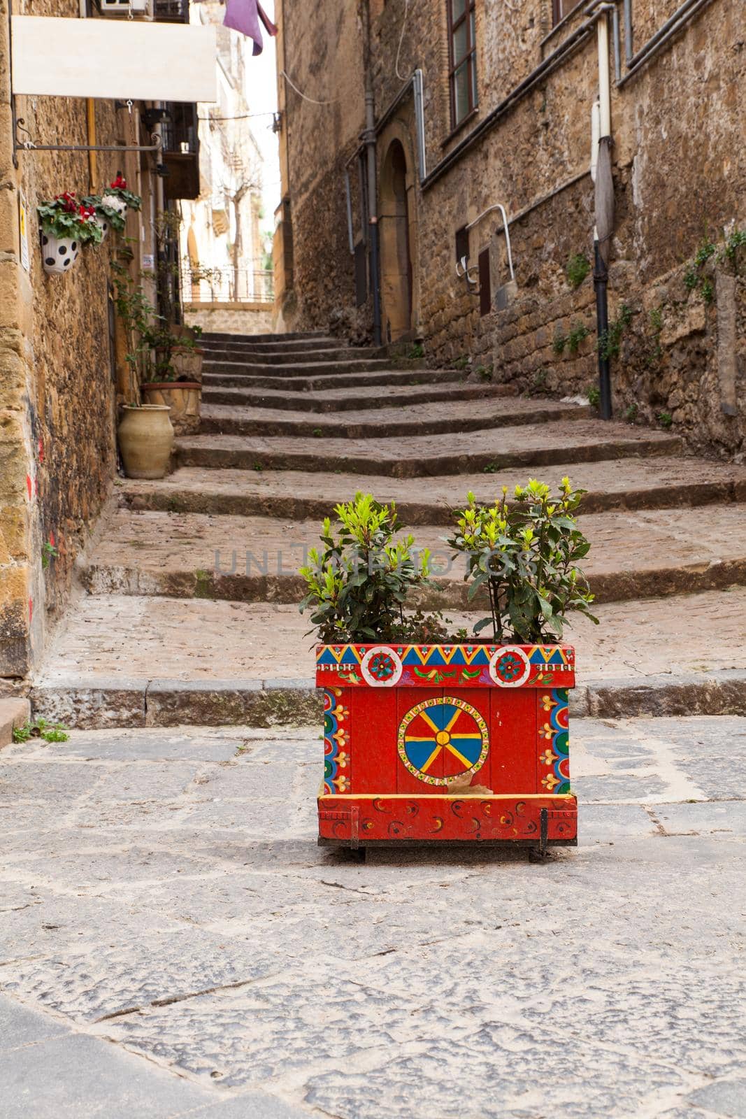 Decorated pot in the alley of Piazza Armerina, Sicily. Italy