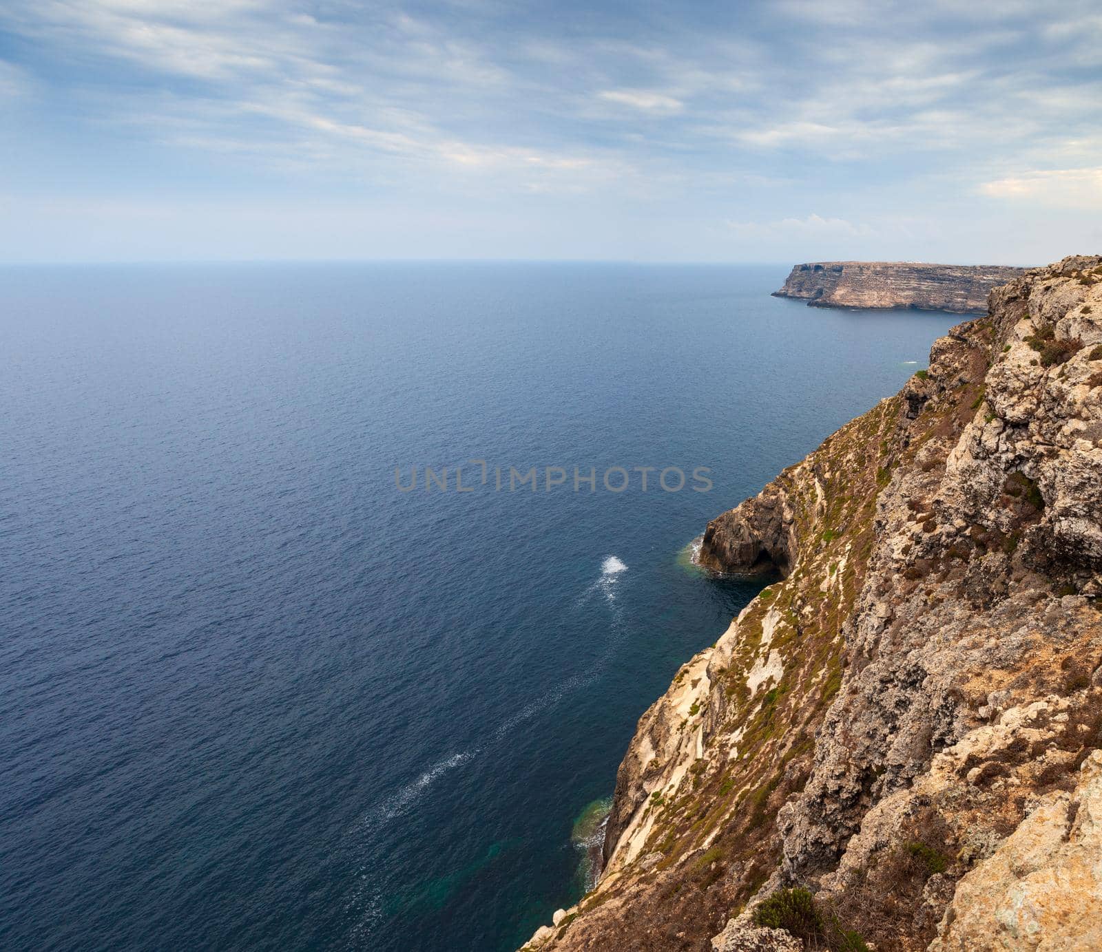 View of the scenic cliff coast of Lampedusa, Sicily