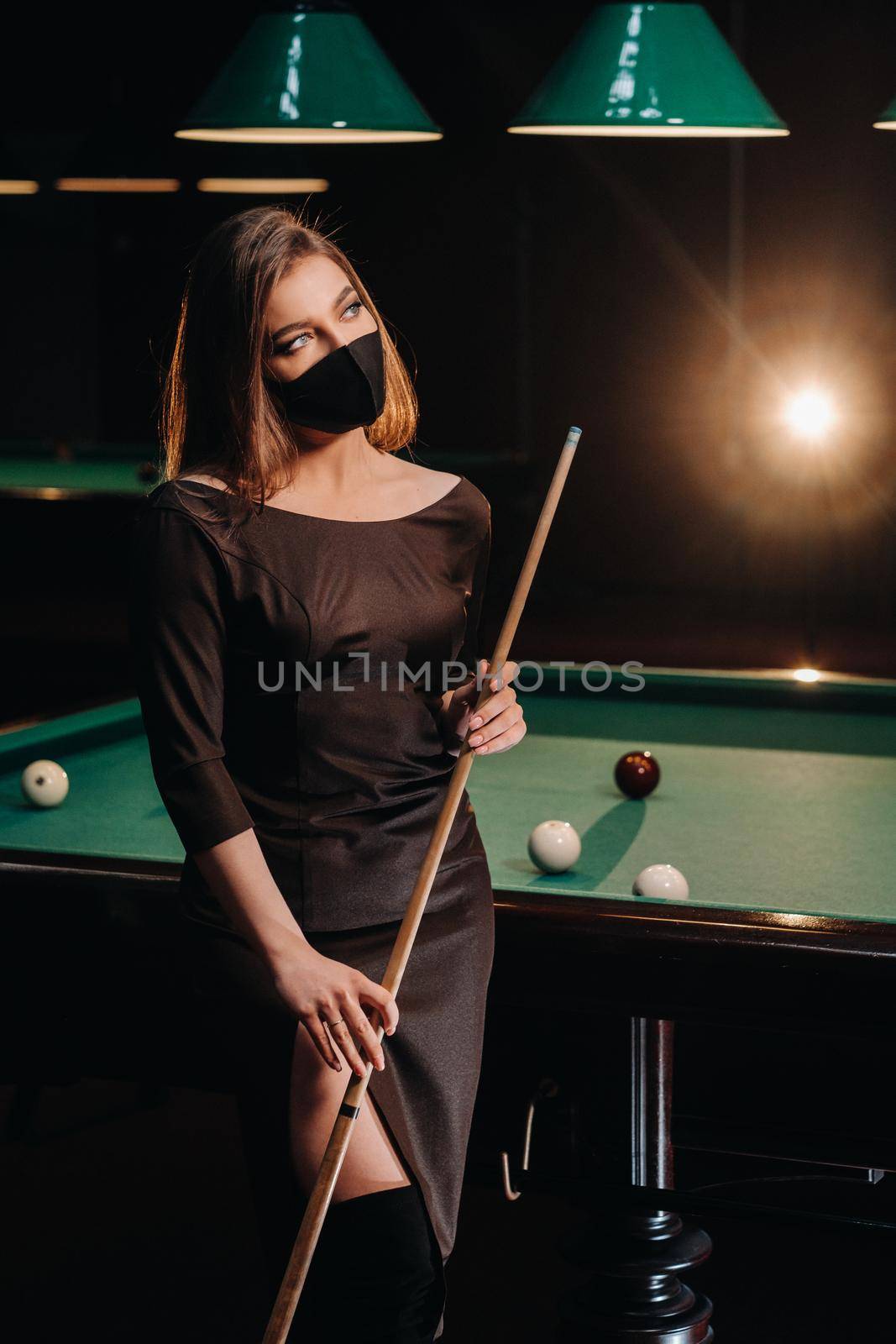 Masked girl in a pool club with a cue in her hands by Lobachad