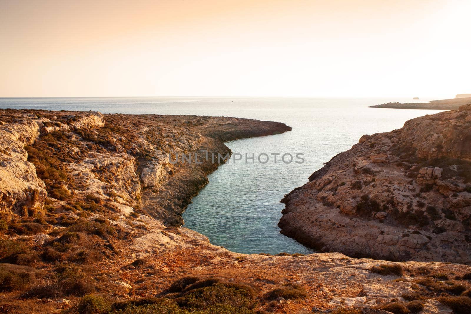 View of Cala Stretta at sunset in the summer season, Sicily