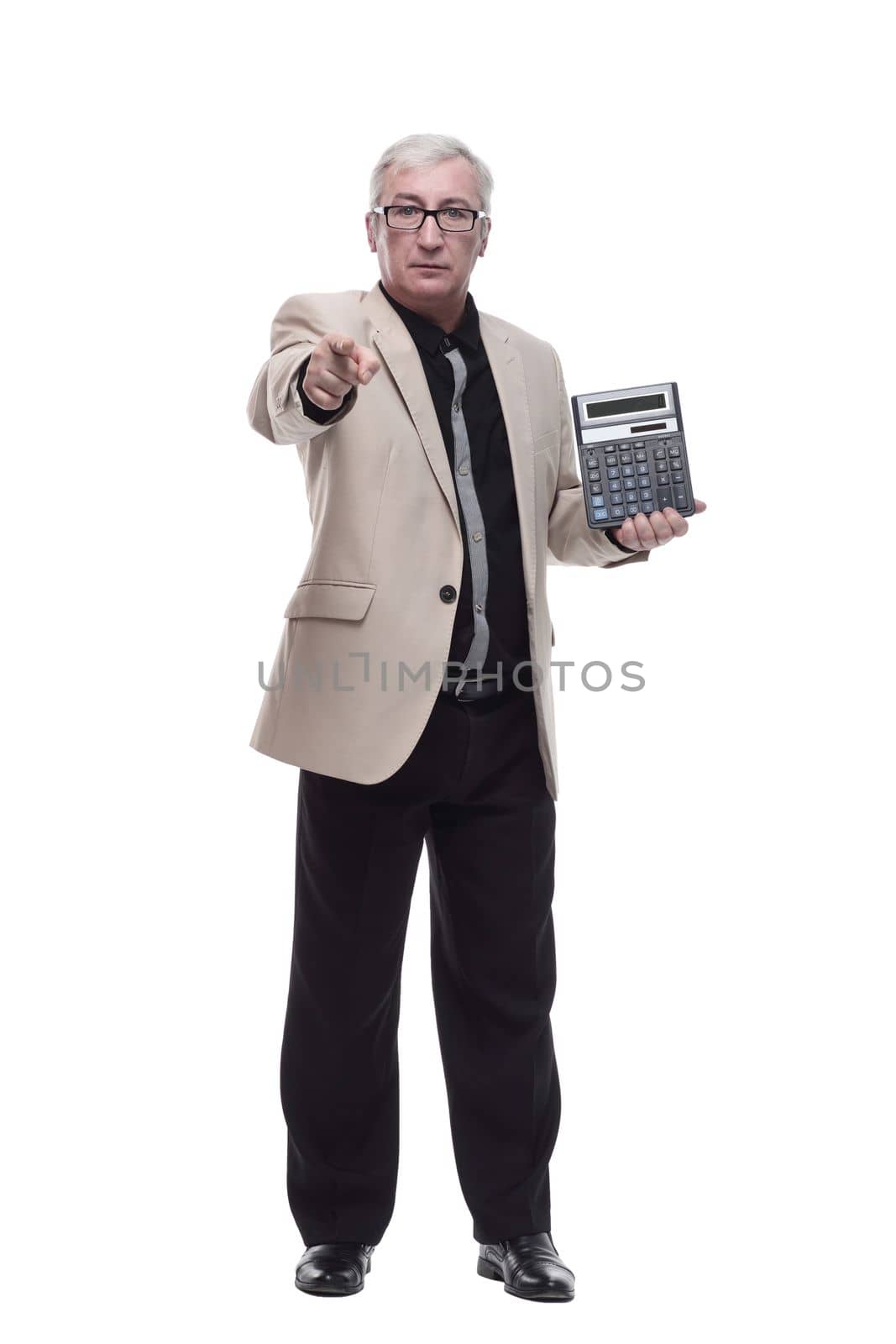 in full growth. Mature intelligent man with a calculator. isolated on a white background.