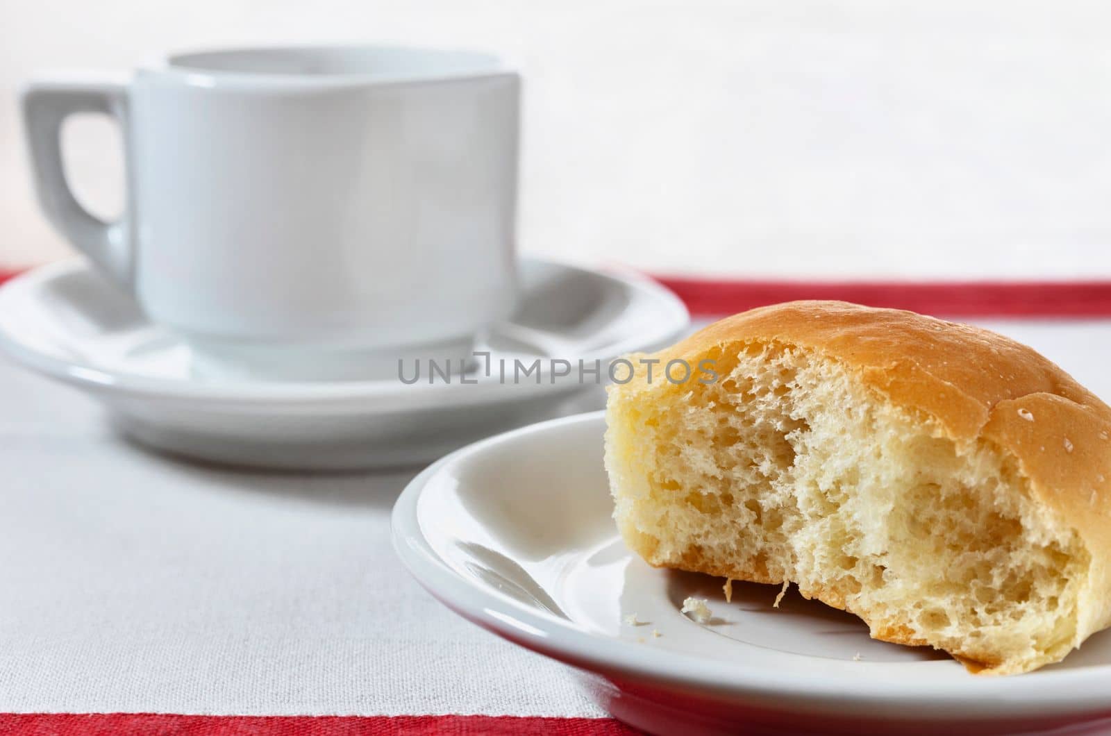 White cup of coffee and dessert with a bite  on table , , break time