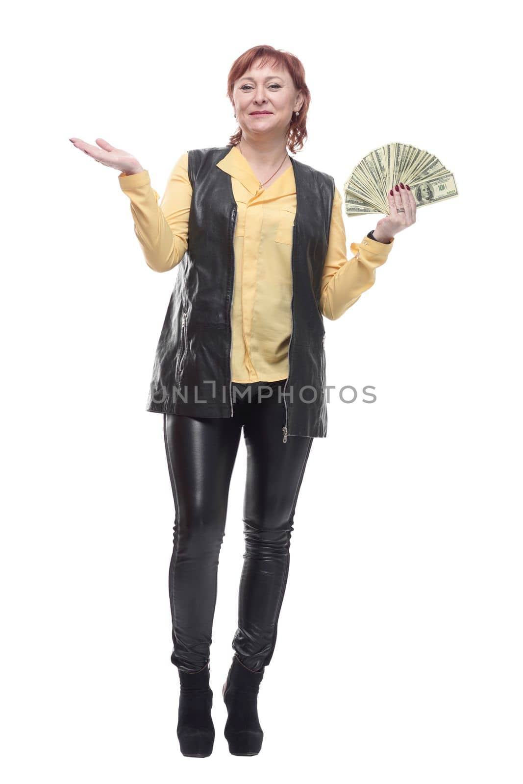 happy mature woman with a fan of banknotes. by asdf