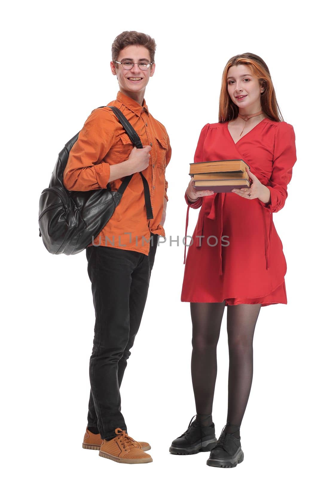 Young woman and man standing with books and bags, isolated on white background