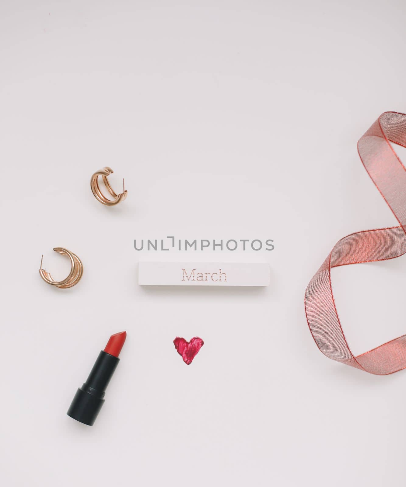 Concept Women's Day, Valentines Day, March 8. Lipsticks, cosmetic makeup products and accessories flatlay top view. by paralisart