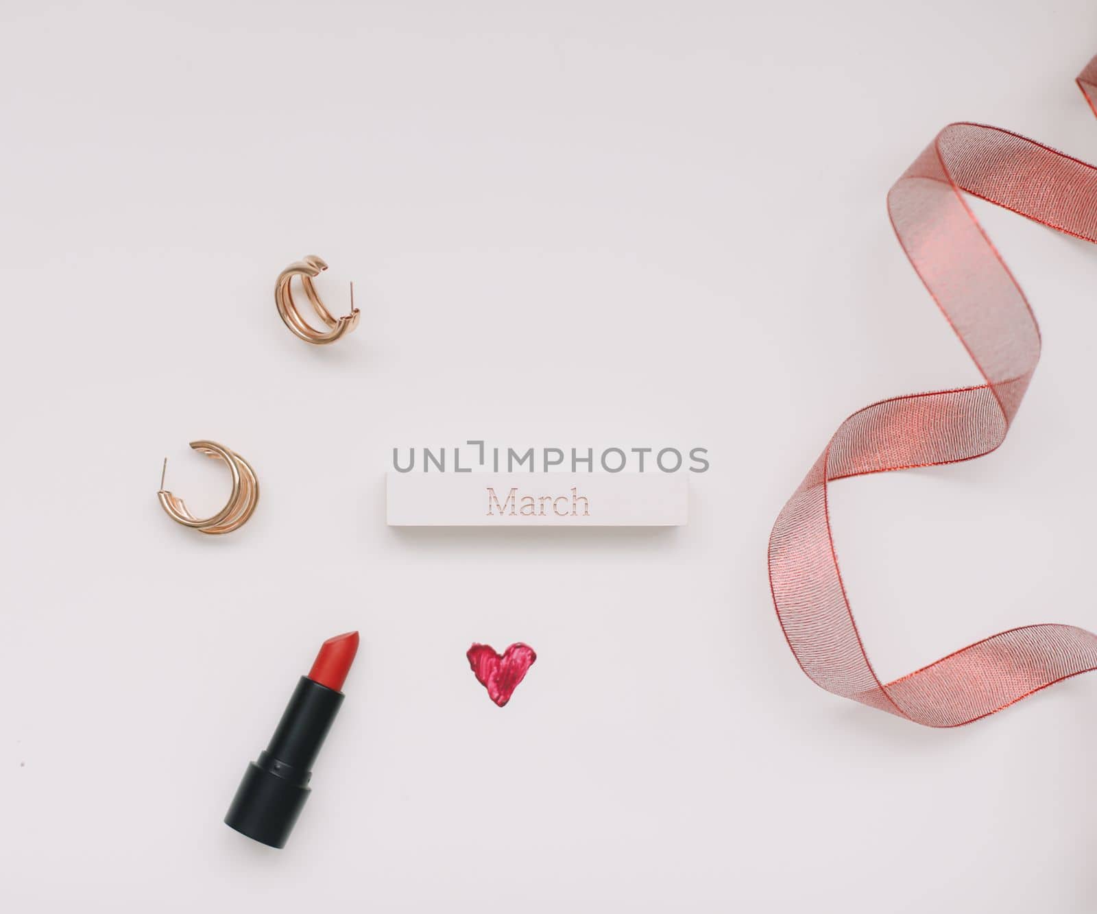 Concept Women's Day, Valentines Day, March 8. Lipsticks, cosmetic makeup products and accessories flatlay top view. by paralisart