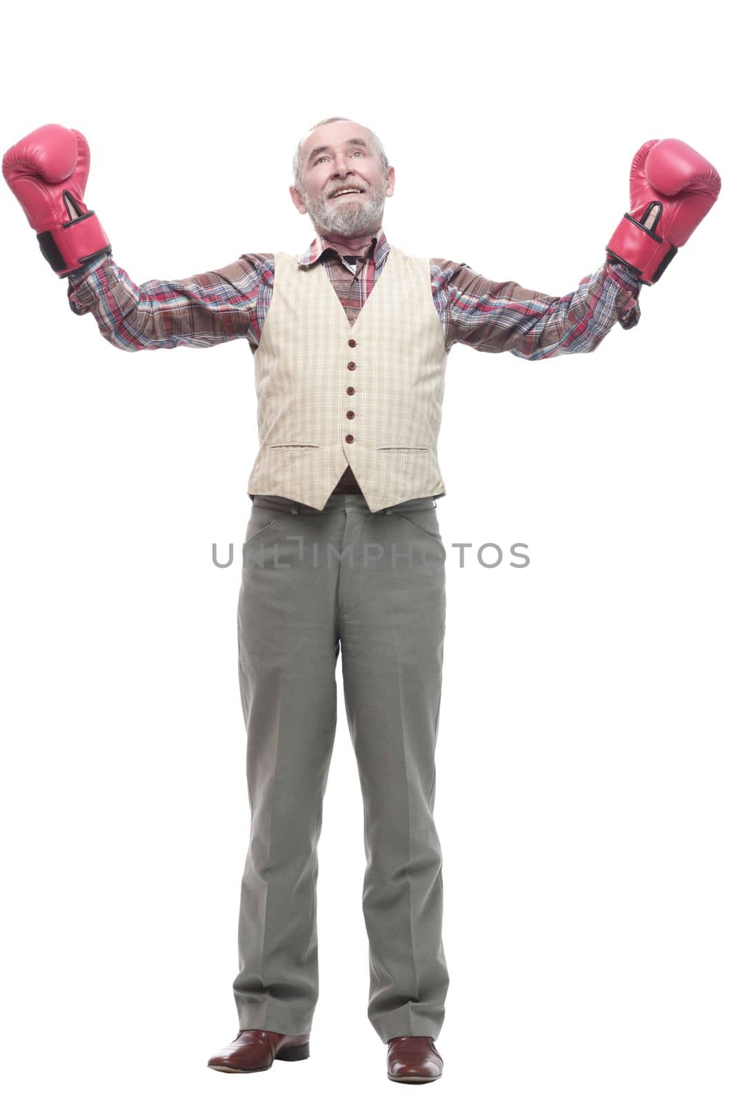 confident older man in Boxing gloves. isolated on a white background.