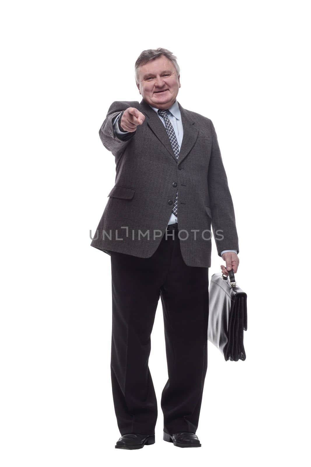 in full growth.Executive business man with a leather briefcase . isolated on a white background.
