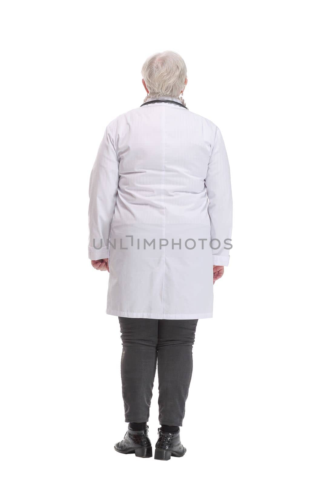 Back view of a female doctor looking at white. Full length shot