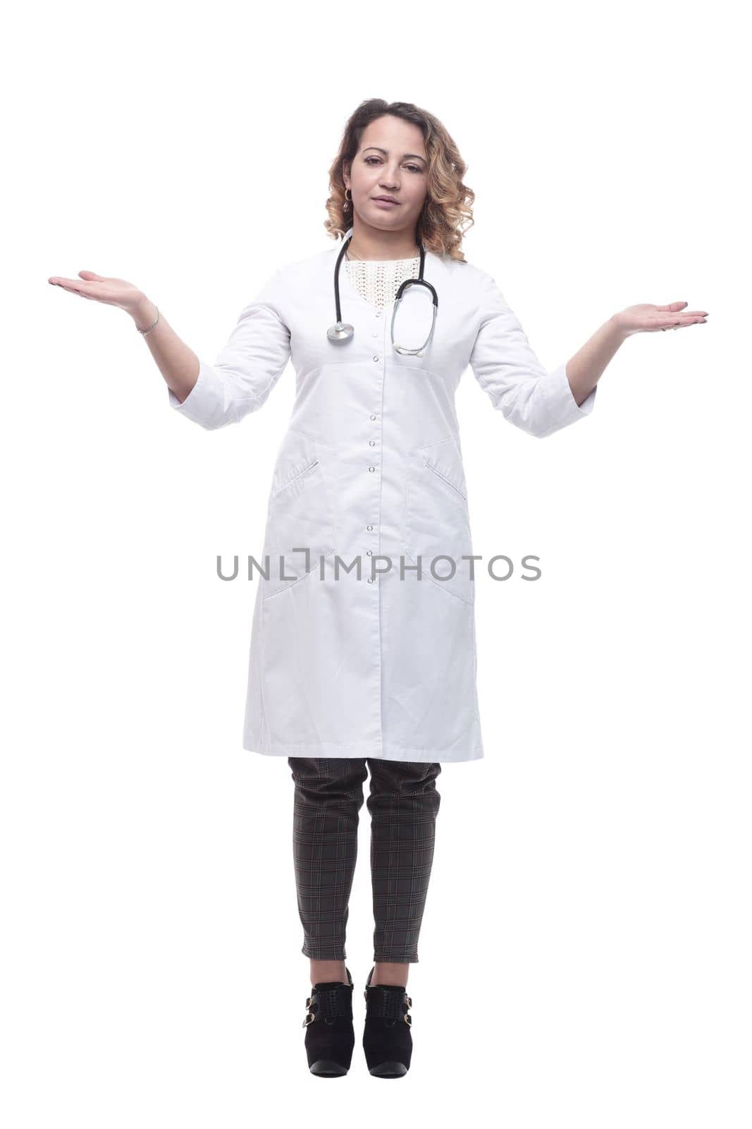 in full growth. young woman doctor with a stethoscope. isolated on a white background.
