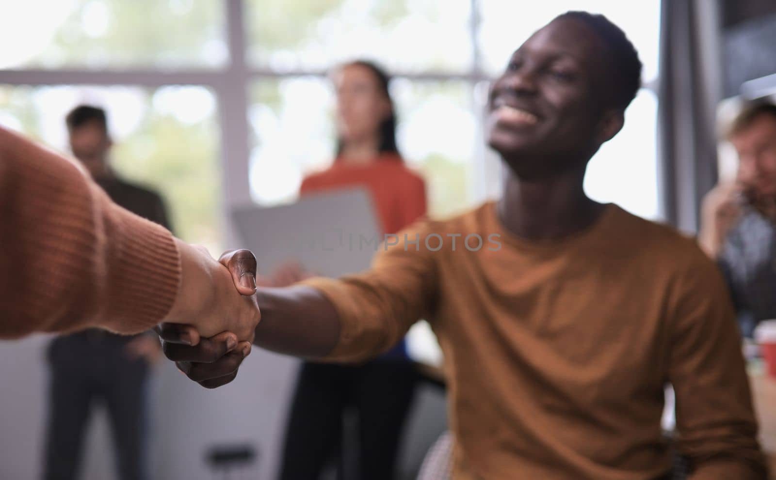 Close up view of business partnership handshake concept