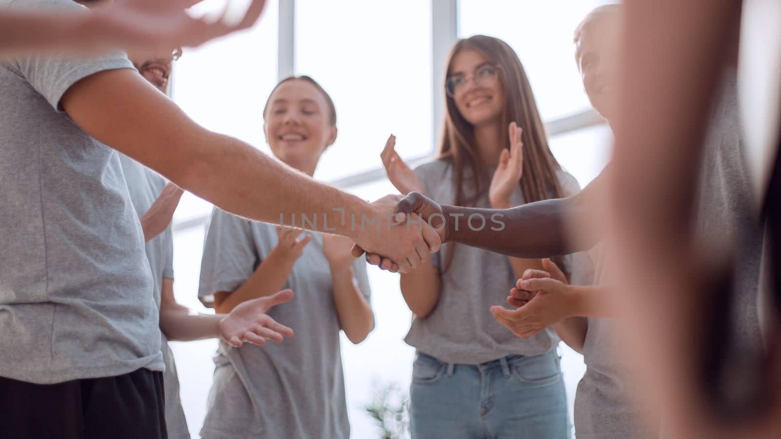 close up. contact group leaders shake hands. the concept of unity