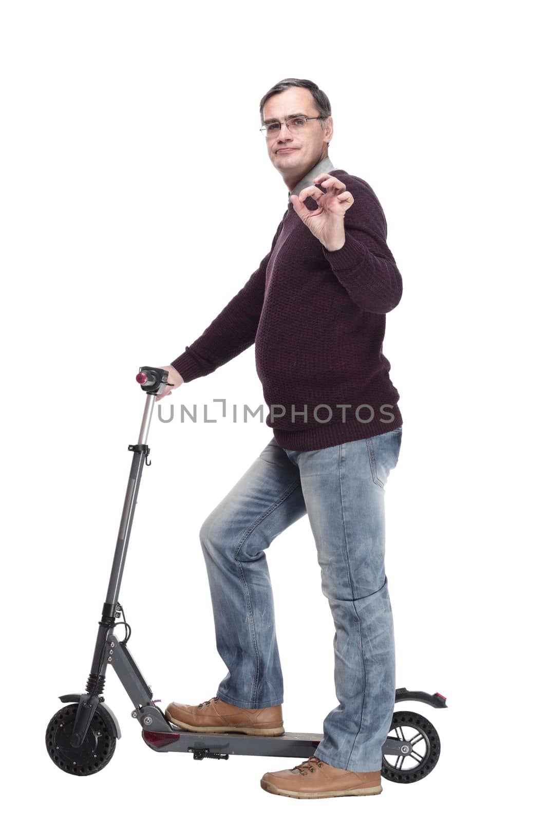 casual man with electric scooter. isolated on a white background.