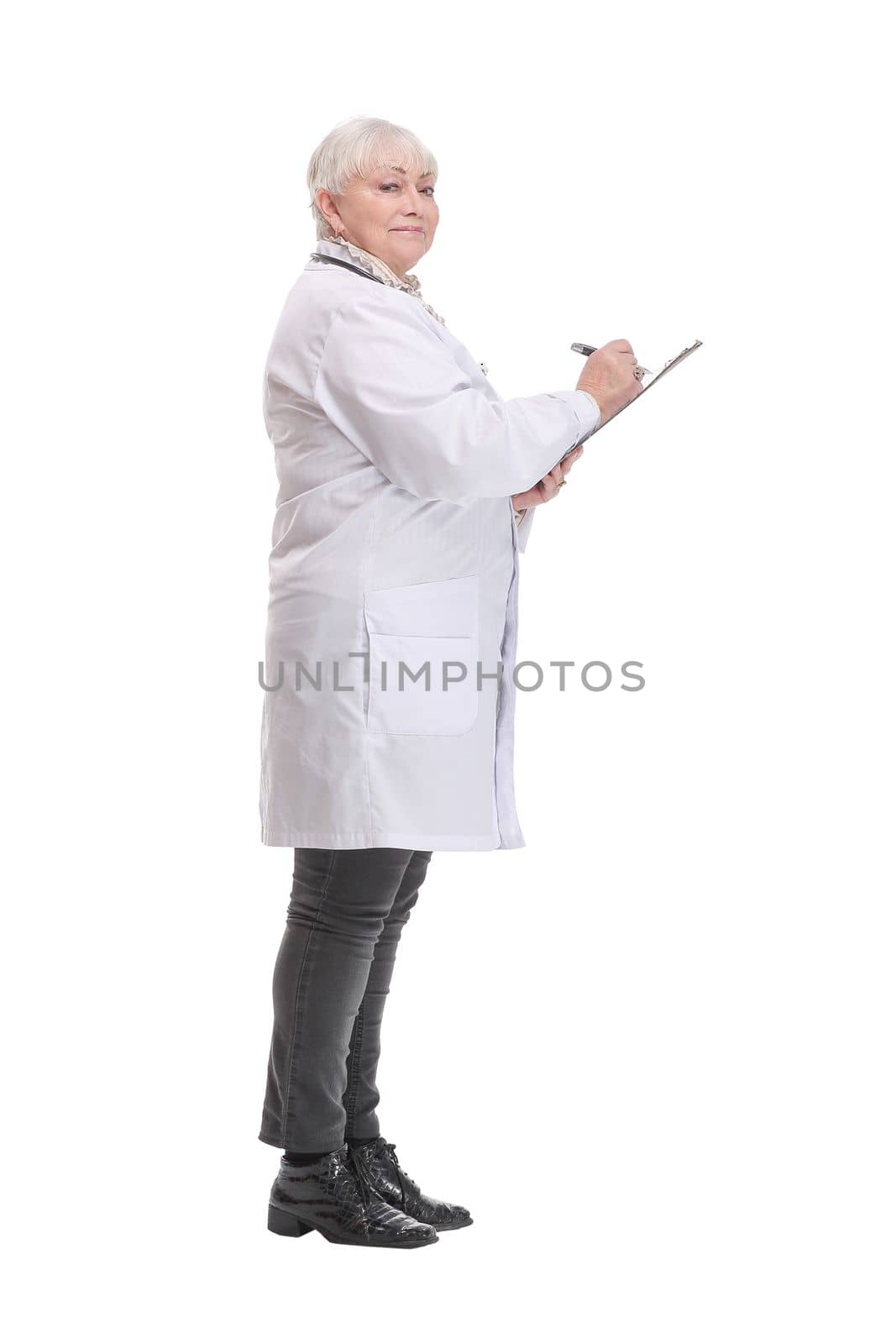 Profile side view portrait of mature doctor writing recommending filling medical form isolated over white background