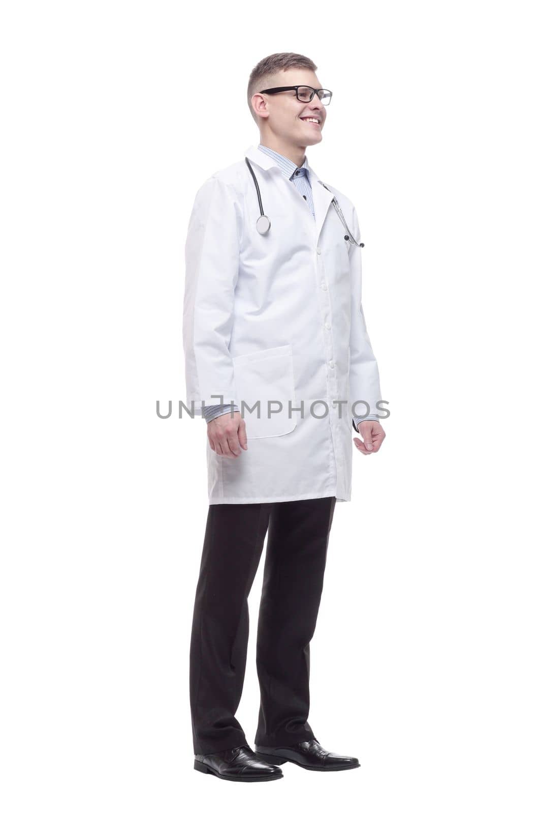 in full growth. confident young doctor with a stethoscope. isolated on a white background.